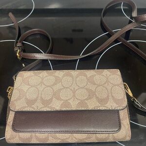 Canvas Crossbody with Dark Brown Trim. This is not designer